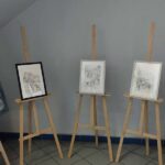 Spotkanie z Markiem Hołdą w Miechowskiej Bibliotece: W tle "Saga Miechowska" Edwarda Hołdy